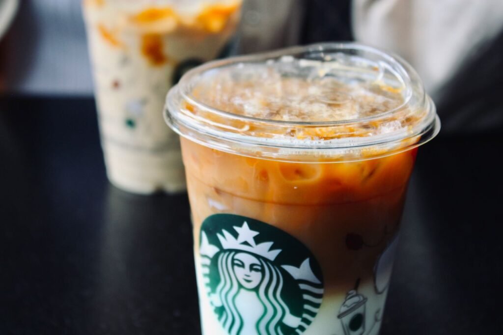pumpkin cream cold brew Close-up of iced coffee drinks with milk in a Ciudad de México café setting.