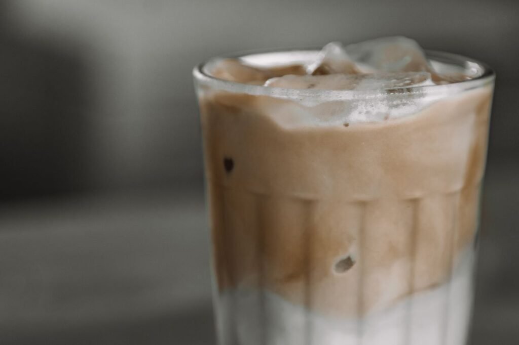 Best at home iced coffee. Close-up of a refreshing iced coffee in a glass, perfect for a summer day.
